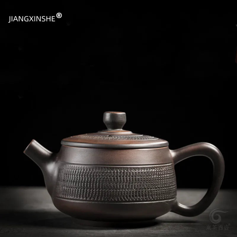 Théière authentique en poterie violette Jianshui